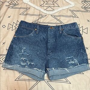 Vintage custom distressed Wrangler cut off shorts